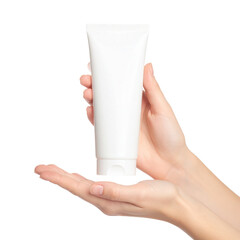 A hand is holding a blank white cosmetic tube against a black background, ready for branding or product display.