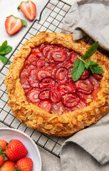 Delicious homemade strawberry galette cooling on a wire rack