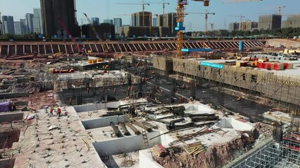 Evergrande soccer stadium construction activity in China - Powered by Adobe