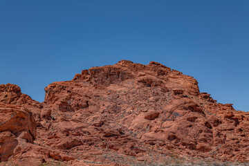 Fototapeta premium Aztec Sandstone, Early Jurassic geological formation of primarily eolian sand . Beehive rock formations,Valley of Fire State Park, Clark County, Nevada geology. Weathering. Desert varnish