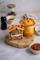 English pie with three types of meat, nuts, spices and French mustard.