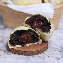 Chocolate pia bread with melted chocolate filling. in the photo with a white background