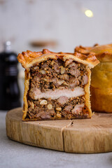 English pie with three types of meat, nuts, spices and French mustard.
