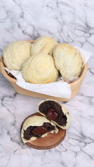 Chocolate pia bread with melted chocolate filling. in the photo with a white background