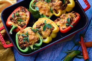 Stuffed Peppers with Meat, Rice, and Vegetables in a Baking Dish