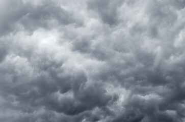 Apocalyptic storm sky with dark rain clouds and heavy atmosphere