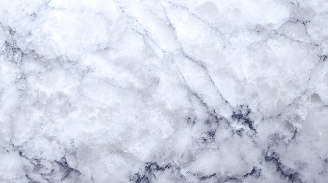 Elegant marble surface with a soft neutral tone and subtle cloudy mineral patterns creating a clean and sophisticated background texture