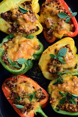 Top View of Grilled Stuffed Bell Peppers with Ground Meat – Rustic Food Background