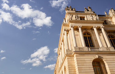 Ornate details and golden accents embellish the facade of a historical building, showcasing...