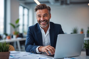Obraz premium Minimal Smiling Man Using Laptop - Businessman Working in Office