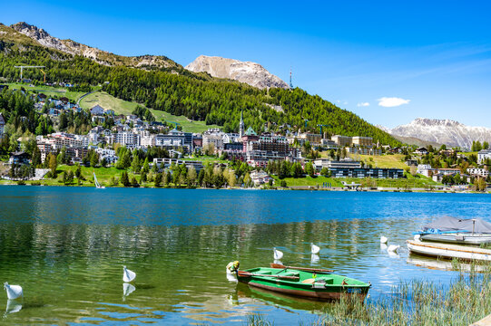 The village and lake of St. Moritz in spring. Engadine, Switzerland. - Powered by Adobe