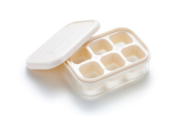 empty plastic ice block mold with lid on white background