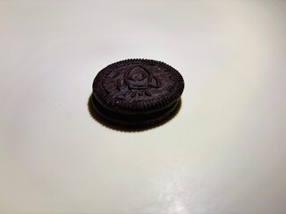 Chocolate biscuits with vanilla topping