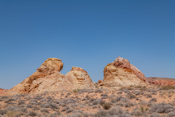Fototapeta premium Aztec Sandstone, Early Jurassic geological formation of primarily eolian sand . Mouse's Tank Road, Valley of Fire State Park, Clark County, Nevada geology.