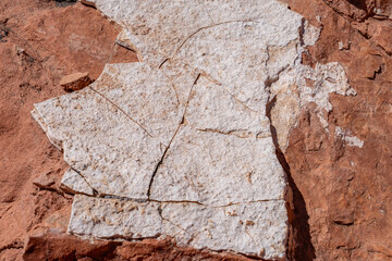 Fire Wave Trail, red Aztec Sandstone outcrops, Early Jurassic geological formation of primarily eolian sand. Valley of Fire State Park, Clark County, Nevada geology. Weathering. Caliche / Calcrete. 