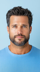 Obraz premium Casual man in blue sweater on blue background