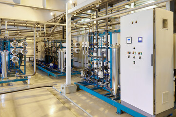 Modern industrial reverse osmosis water purification system in a clean and efficient technical...