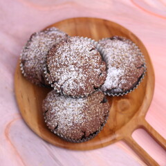 Chocolate Smurf Bread sprinkled with powdered sugar and chocolate paste inside