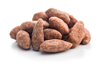 Almond nuts coated in sugar and honey isolated on white background.