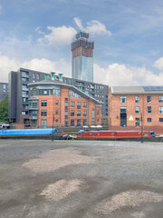 Salford, Manchester, uk ,august 17, 2024 Castlefield district, waterway canal area with a narrowboat.