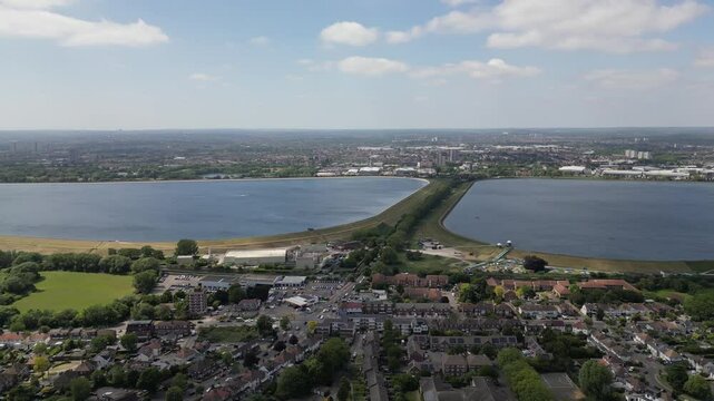 Short 4K aerial video near Chingford, panning across William Girling Reservoir, King George&rsquo;s Reservoir, and Epping Forest.