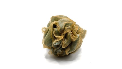 yellow green shower puff or bath sponge on white background