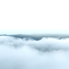 Serene mountain landscape with misty clouds enveloping the peaks during early morning light