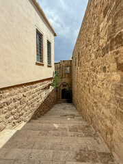 The streets of Mardin, the old historical city made up of stone houses.