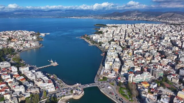 Establishing aerial view of the City of Chalikda, Euboea, Greece, with the old Evripus bridge connecting the city and mainland
