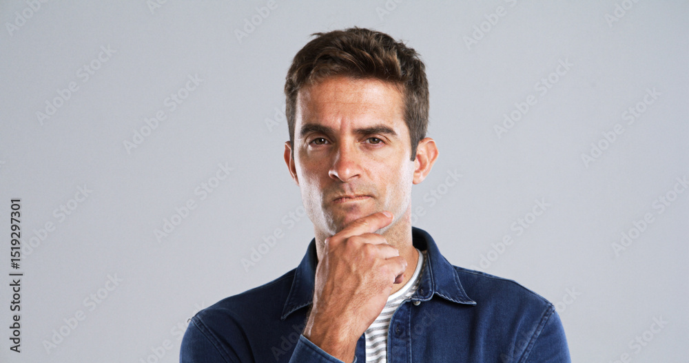 Aufkleber Thinking, man and doubt with portrait in studio for fake news, problem solving or brainstorming. Mockup space, puzzled and person contemplating with question, solution or wondering on gray background