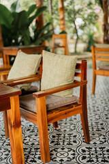 Beautifully Designed Stylish Wooden Chairs Set in a Cozy, Inviting Outdoor Environment