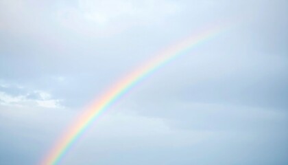 Pastel Rainbow Arch In Cloudy Sky