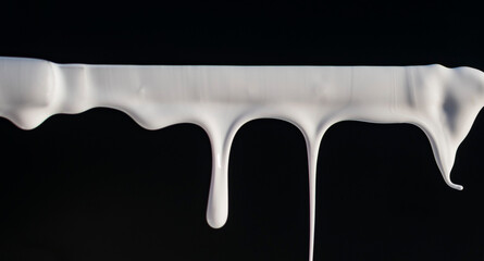 Dripping paint on a dark background