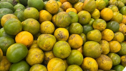 Pile of fresh oranges local asian