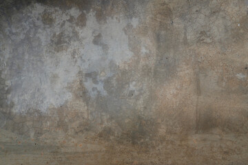 This close-up reveals the raw, aged texture of a polished concrete floor. Its surface exhibits a fascinating interplay of subtle variations in tone and intricate patterns.