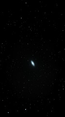 A stunning view of a distant galaxy illuminated against the dark expanse of space, showcasing cosmic beauty.