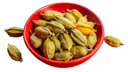 Green cardamom pods in red bowl isolated on transparent background isolated on white background