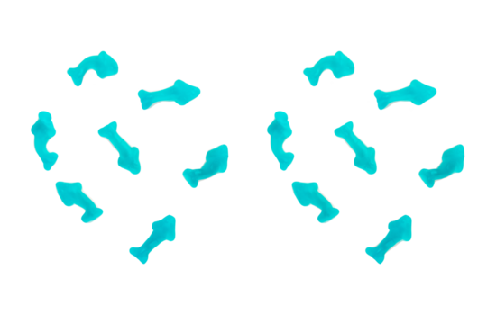 Jelly fish candies. Gummy shark, blue dolphin jelly coated with sugar on a transparent background.