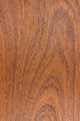 texture of wood. wooden board.valuable raw, solid, lumber. Sapele, sapelli, sapeli, mahogany, Entandrophragma, red wood, view from above. vertical texture