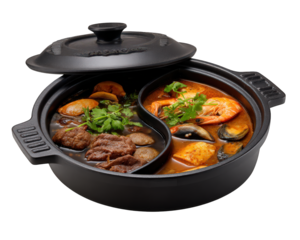 Divided hotpot featuring yin yang design, showcasing variety of ingredients including seafood and meat, garnished with fresh herbs. This dish is perfect for sharing and enjoying diverse flavors