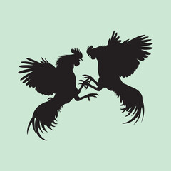 vector silhouette of a fighting rooster © Wiwit