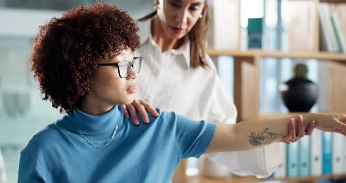 Woman, physiotherapist or patient with arm exercise for flexibility or muscle recovery at clinic. Female person, chiropractor and helping client with physical activity for therapy at private practice