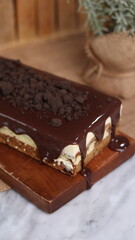 Tiramisu Chocolate Cake with wooden stand