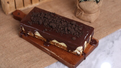 Tiramisu Chocolate Cake with wooden stand