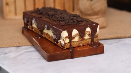 Tiramisu Chocolate Cake with wooden stand