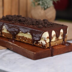 Tiramisu Chocolate Cake with wooden stand