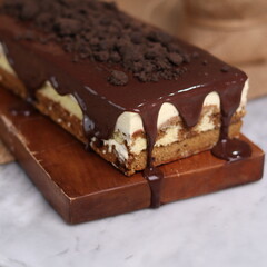 Tiramisu Chocolate Cake with wooden stand