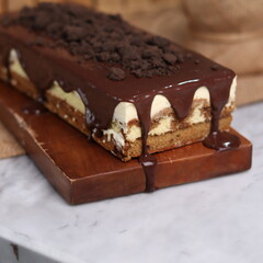 Tiramisu Chocolate Cake with wooden stand