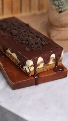 Tiramisu Chocolate Cake with wooden stand