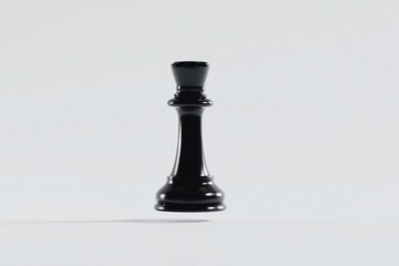 A sleek black queen chess piece floats above a smooth surface, highlighting its intricate design and craftsmanship in a minimalist setting